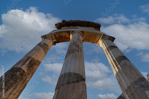 The Athena temple complex, including the Delphic Tholos, Archeological site of Delphi, Greece photo