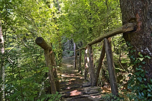 Bridge crossing the Skra Waterfall in Greece photo