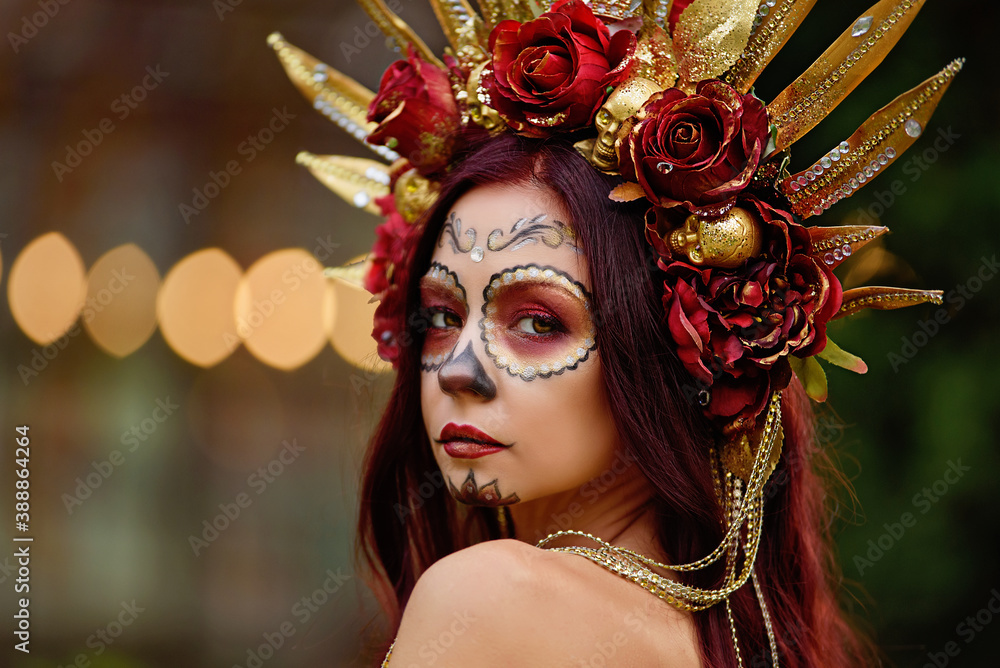 Closeup portrait of Calavera Catrina in red dress. Sugar skull makeup. Dia de los muertos. Day of The Dead. Halloween