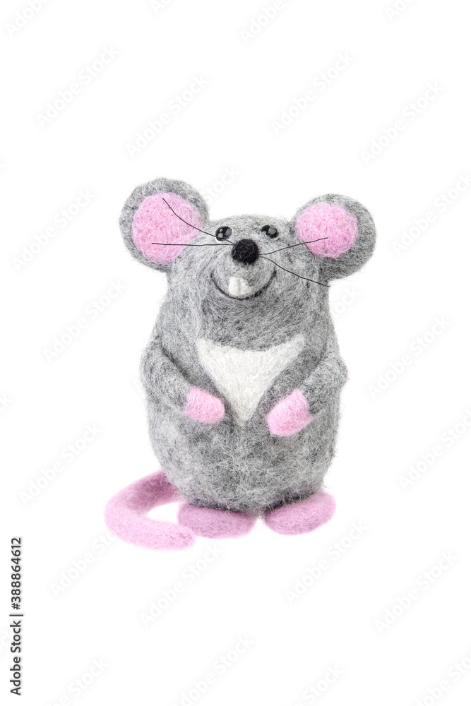 Toy mouse made of felted wool isolate on a white back. Gray toy mouse. Toy mouse made of felted wool isolate on a white back. Gray toy mouse.