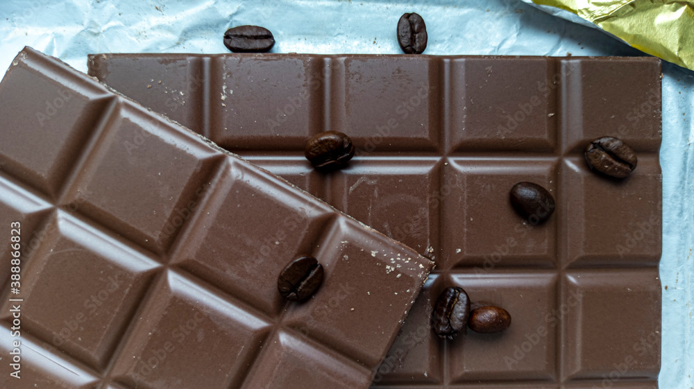 Photo of chocolate bar, coffee beans