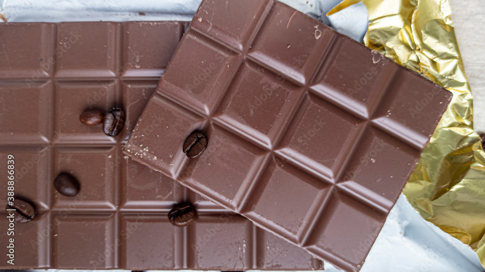 Photo of chocolate bar, coffee beans
