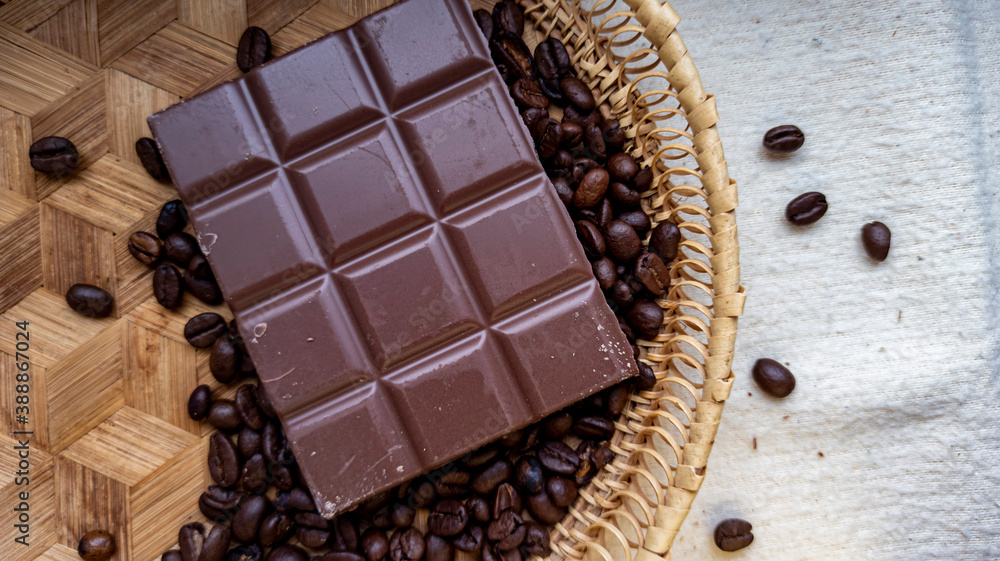 Photo of chocolate bar, coffee beans