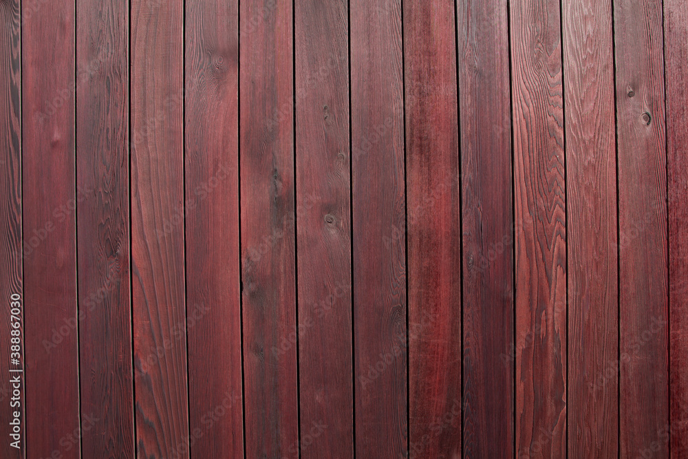 Naklejka premium Red vertical wooden board texture background