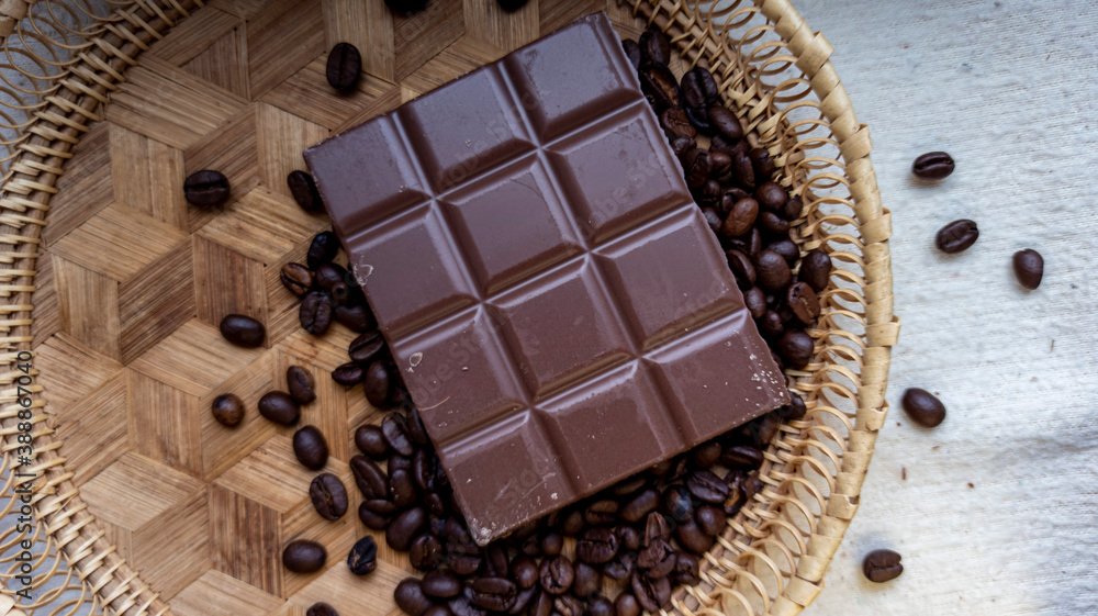 Photo of chocolate bar, coffee beans