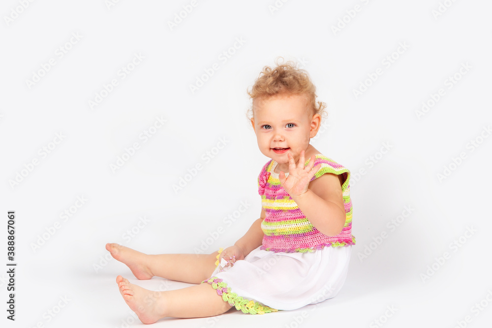 little girl with curly hair on a light background little girl with curly hair on a light background