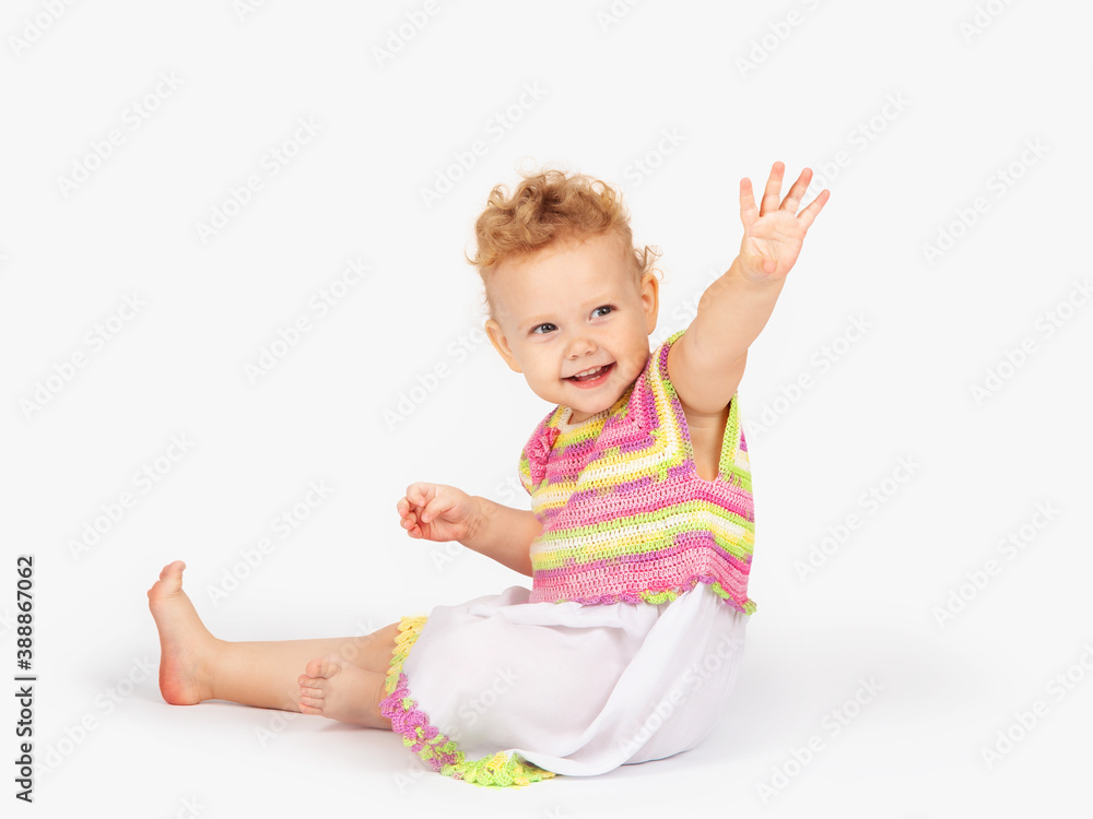 little girl with curly hair on a light background little girl with curly hair on a light background