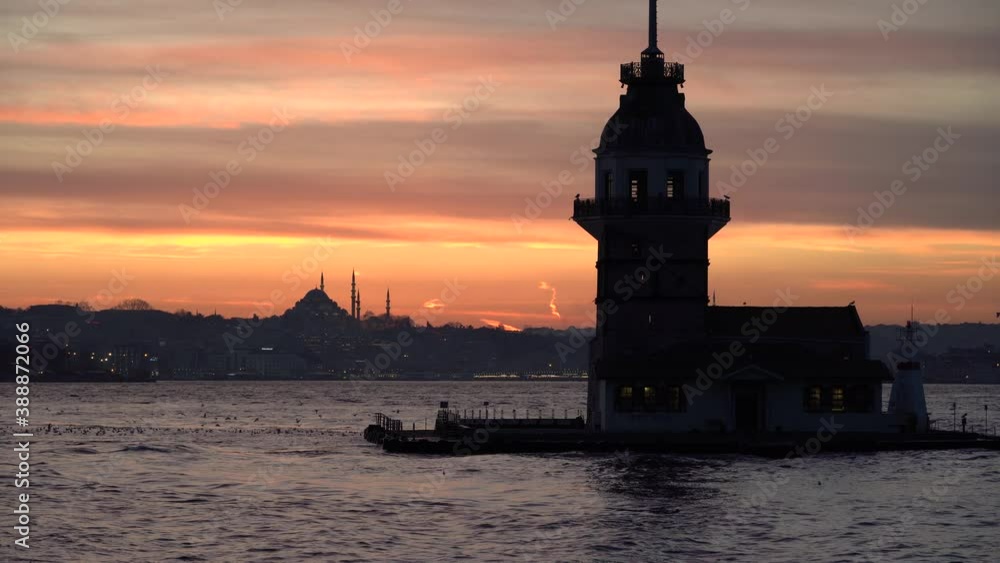 Maiden Tower / Kiz Kulesi at beautiful sunset. Sunset panorama clip taken at Bosphorus, in Uskudar region of Istanbul, Turkey Maiden Tower / Kiz Kulesi at beautiful sunset. Sunset panorama clip taken at Bosphorus, in Uskudar region of Istanbul, Turkey