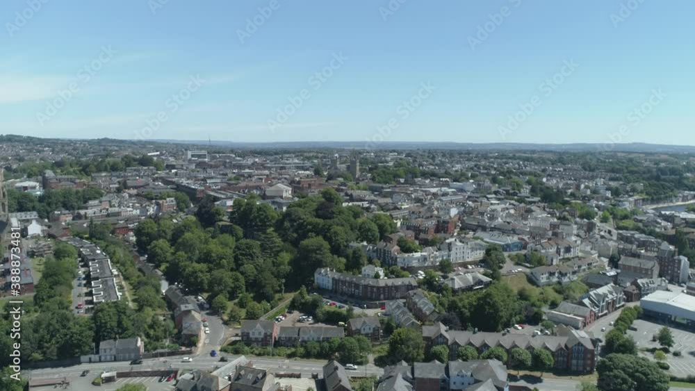 Aerial tracking forward over a city in bloom in Exeter, Devon Aerial tracking forward over a city in bloom in Exeter, Devon