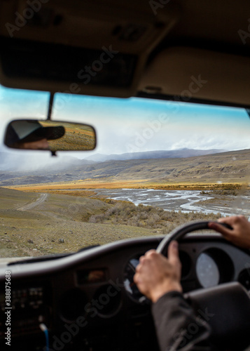 beautiful landscape with mountains and rivers from the driver‚Äôs window photo