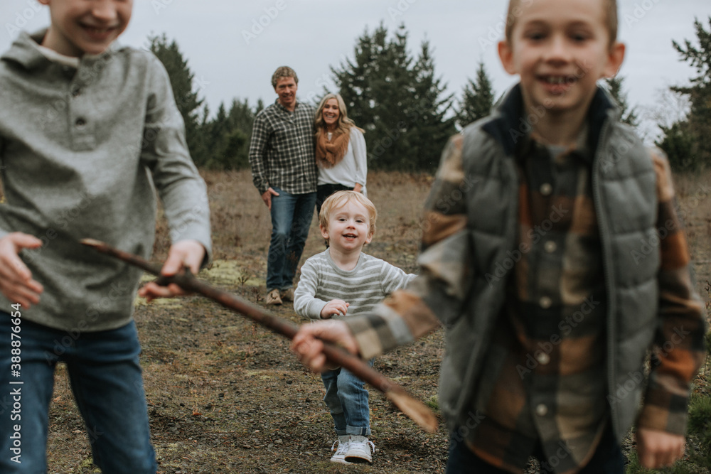 Fun Family Portrait with Children Running Fun Family Portrait with Children Running