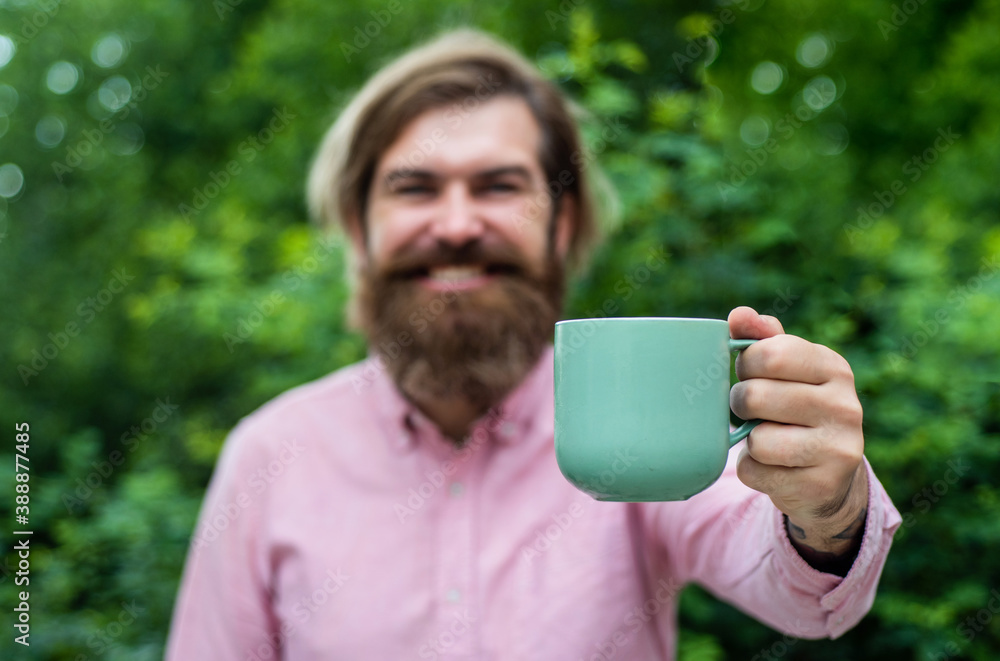 Morning inspiration. feel real happiness. full of energy. hot tea in cup. time for lunch. little coffee break. bearded man relax outdoor. happy man drink fresh morning coffee. good morning to you Morning inspiration. feel real happiness. full of energy. hot tea in cup. time for lunch. little coffee break. bearded man relax outdoor. happy man drink fresh morning coffee. good morning to you