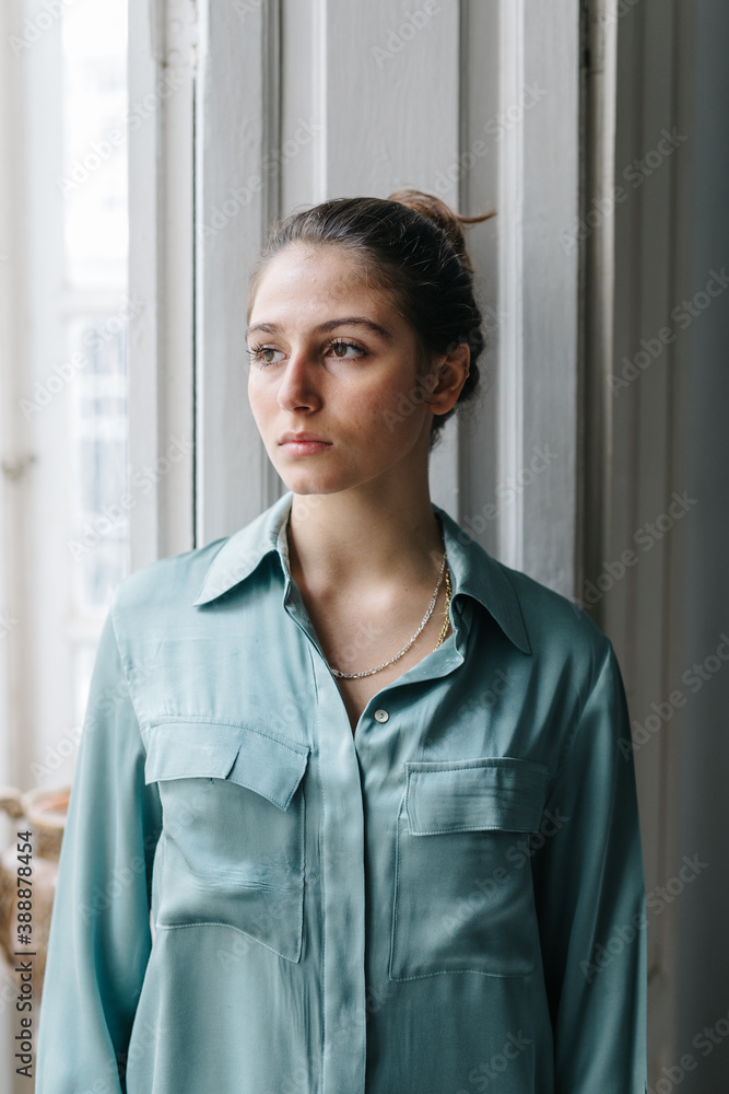 Relaxed female in balcony entrance