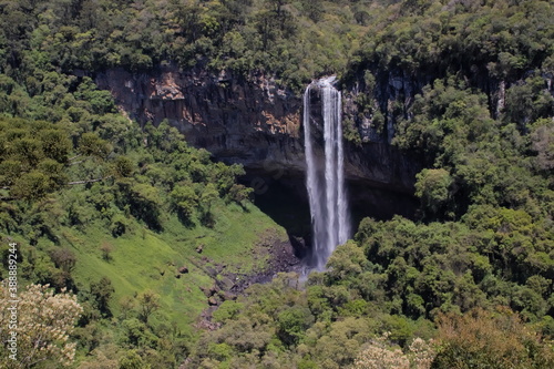 cascade of Caracol, surrounded by a green area, great waterfall in a basalt wall in Caracol park.