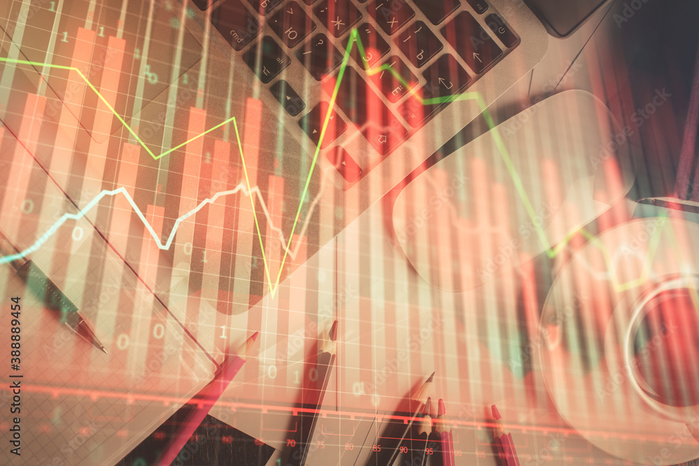 Double exposure of financial chart drawing over table background with computer. Concept of research and analysis. Top view. Double exposure of financial chart drawing over table background with computer. Concept of research and analysis. Top view.