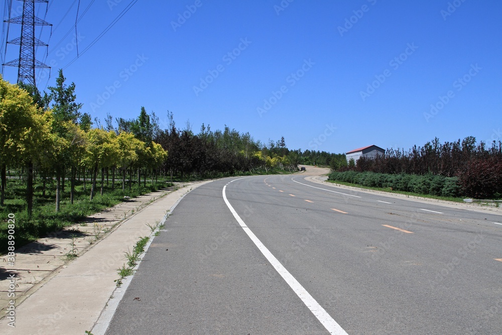 Newly paved straight road in countryside