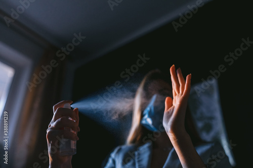 Woman cleaning hands as anti virus protection.