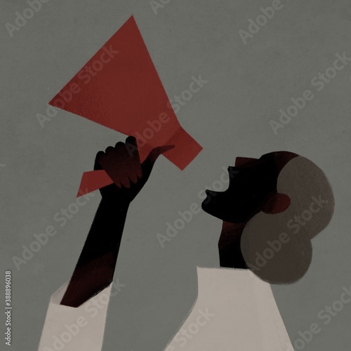Black woman shouting into a megaphone