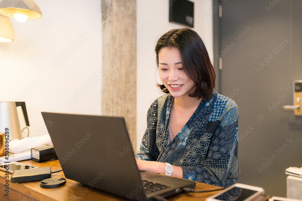 A Chinese beauty is using her mobile phone A Chinese beauty is using her mobile phone