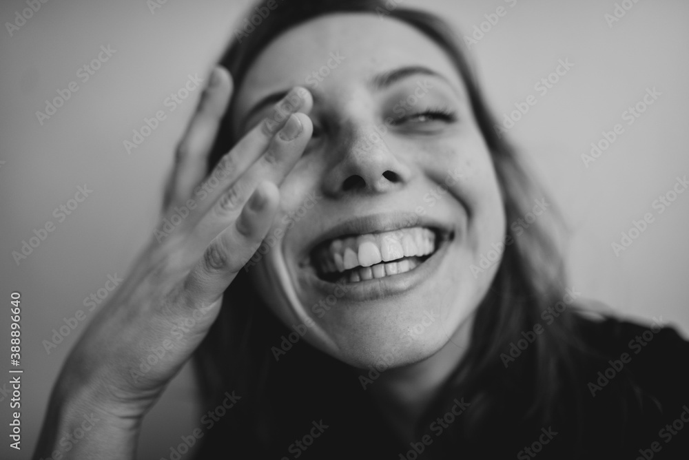 portrait of a young laughing girl portrait of a young laughing girl