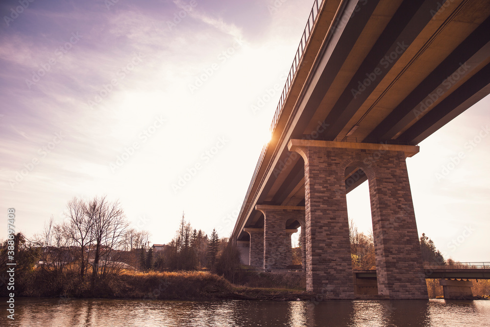 Bridge over river against sky during sunset Bridge over river against sky during sunset