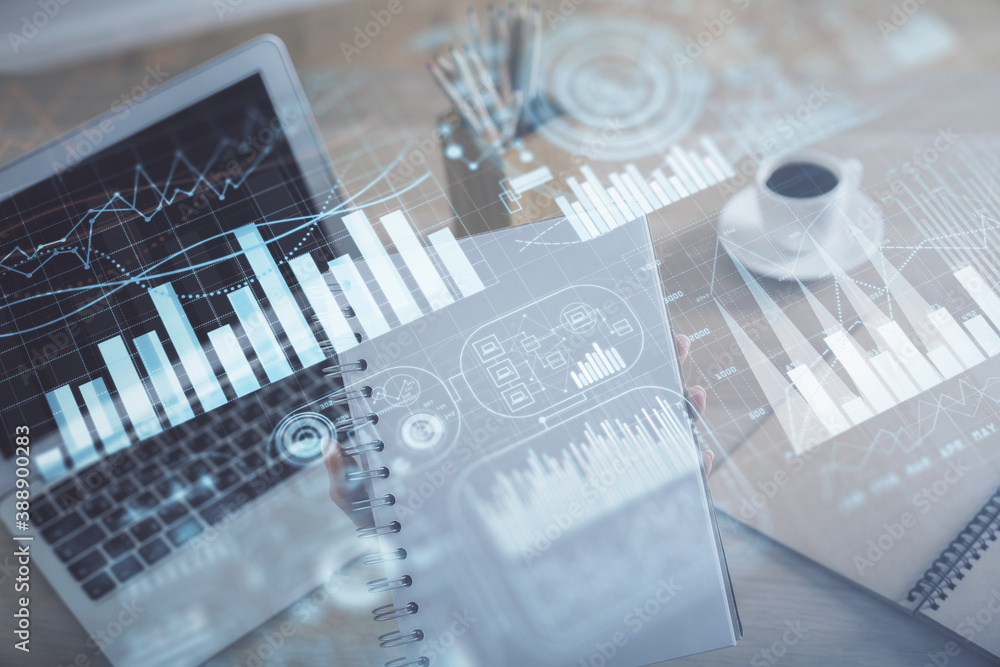 Double exposure of businesswoman hands typing on computer and forex chart hologram drawing. Financial analysis concept. Double exposure of businesswoman hands typing on computer and forex chart hologram drawing. Financial analysis concept.