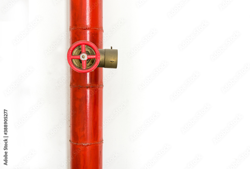 Red Fire protection standpipe with Fire hose valve installed on wall of ...