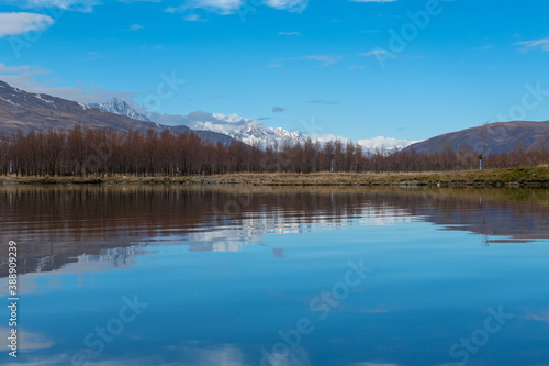 Autumn scenery photography picture of snow-capped mountains, forests and lakes