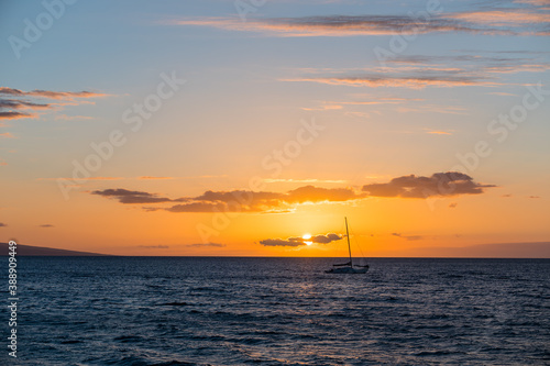 Silhouette of a boat in the Maui coast right before sunset. Hawaii, USA. © Marcos