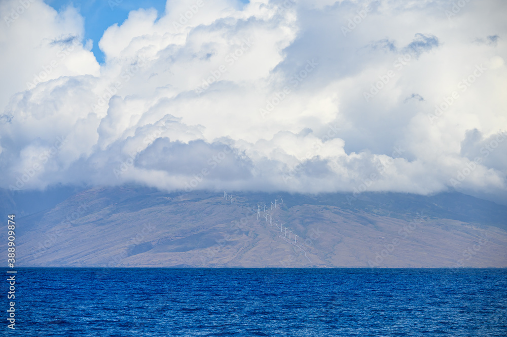Clouds over wind turbines in Maui, Hawaii. Clouds over wind turbines in Maui, Hawaii.