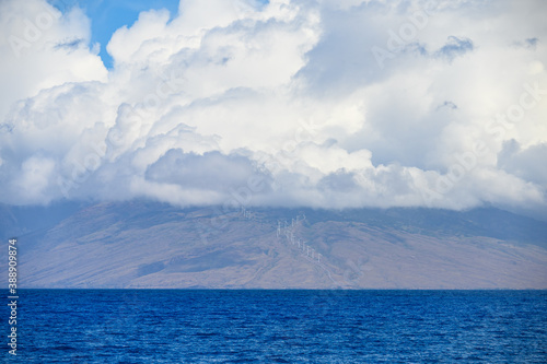 Clouds over wind turbines in Maui  Hawaii.
