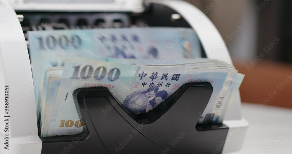 Money counter machine counting New Taiwan dollar Money counter machine counting New Taiwan dollar