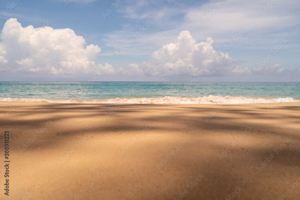 Fototapeta premium Tropical nature clean beach and white sand in summer with sun light blue sky and bokeh background.