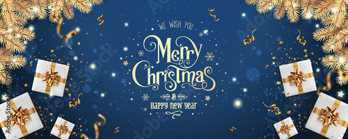Gold Merry Christmas and New Year text on blue holiday background with gold gift boxes, fir branches, ribbons, decoration, sparkles, confetti, bokeh, light. Xmas card. Vector Illustration