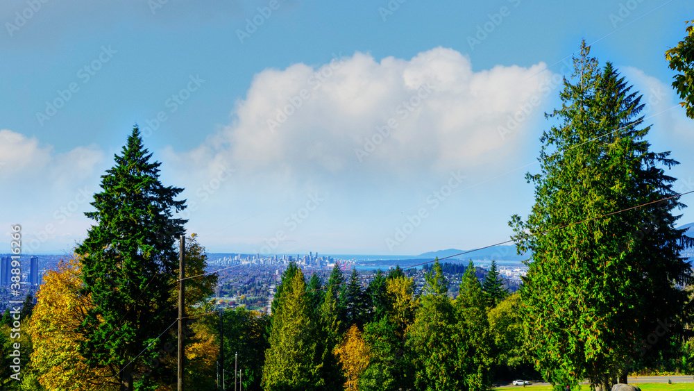 Scenic view from Burnaby Mountain Park in Fall to downtown Vancouver and  Stanley Park