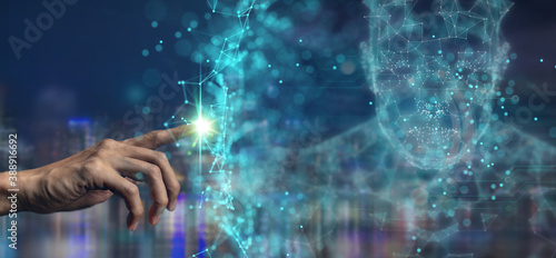 man hand pointing in to futuristic interface network include of artificial intelligence(ai), machine deep learning, robot computer software, digital twin, blockchain, augmented, virtual technology.