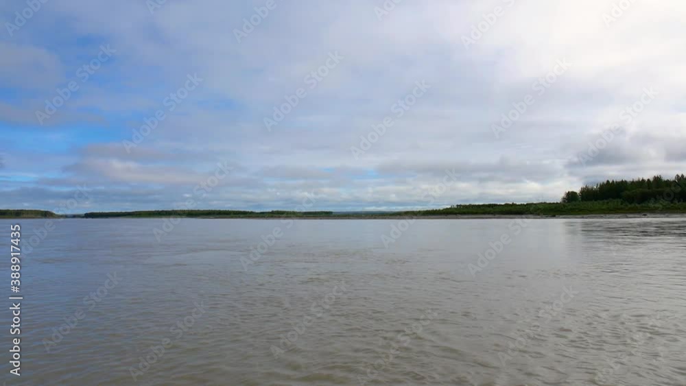 Lake panorama shot from motorboat, distant lakeshore Lake panorama shot from motorboat, distant lakeshore