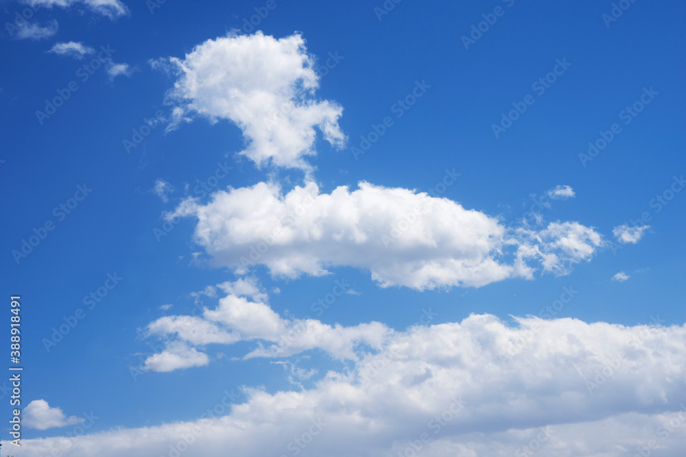 Blue sky and white clouds in the sky on a sunny day Blue sky and white clouds in the sky on a sunny day