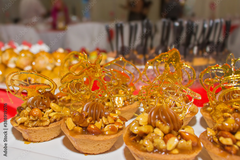 detail of finely decorated desserts at a party