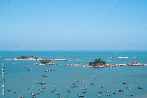 Many fishing boats docked on the sea