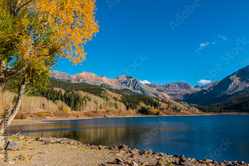 Fototapeta Naklejka Na Ścianę i Meble -  Fall Colors at Trout Lake With Vermillion Peak In The Distance, Trout Lake, Colorado, USA