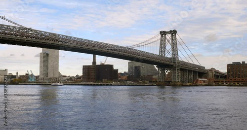 Looking northwest from the Lower East Side of New York City, focusing on the Williamsburg Bridge. At the end of the bridge is Williamsburg in Brooklyn. photo