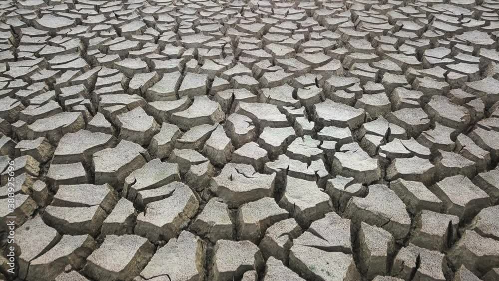 Global warming concept . Dry cracks in the land, serious water shortages. Drought concept. Global warming concept . Dry cracks in the land, serious water shortages. Drought concept.