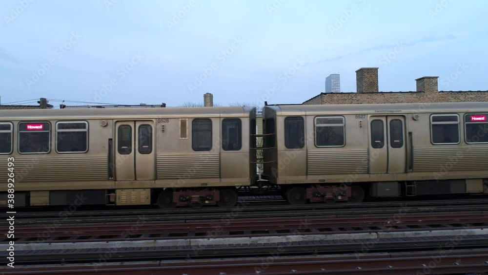 Train in day light. people transportation in big city. train cars and train track. people going to work. cloudy day. Train in day light. people transportation in big city. train cars and train track. people going to work. cloudy day.