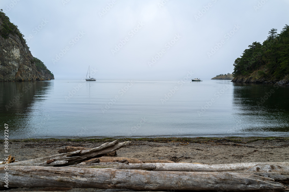 Two boats anchored in Watmough Bay on Lopez Island, Washington, USA
