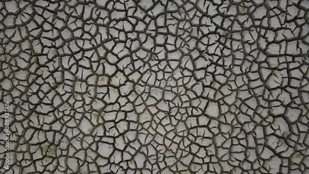 Global warming concept . Dry cracks in the land, serious water shortages. Drought concept. Global warming concept . Dry cracks in the land, serious water shortages. Drought concept.