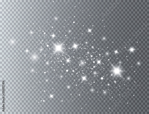 The dust sparks and golden stars shine with special light. Vector sparkles on a transparent background. Christmas light effect. Sparkling magical dust particles.