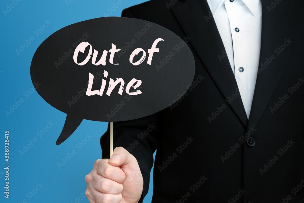 Out of Line. Businessman holds speech bubble in his hand. Handwritten Word/Text on sign. Out of Line. Businessman holds speech bubble in his hand. Handwritten Word/Text on sign.