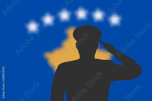 Solder silhouette on blur background with Kosovo flag.