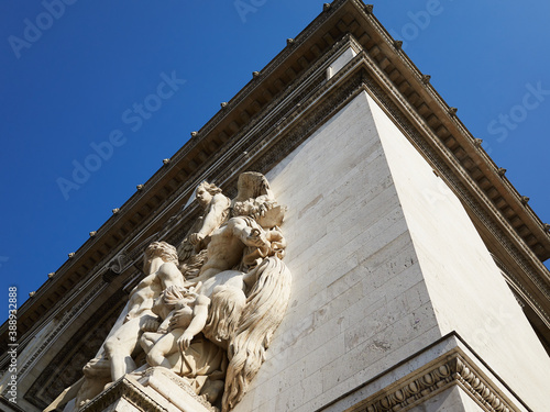 Paris Arc de Triomphe ,Triumphal Arch, place Charles de Gaulle in Chaps Elysees at sunset, Paris, France.